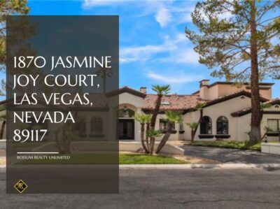 Front view of a luxury home located at 1870 Jasmine Joy Court, Las Vegas, Nevada 89117. The house features a Mediterranean-style design with arched windows, terracotta roof tiles, and well-maintained landscaping. The property is listed by Rossum Realty Unlimited.